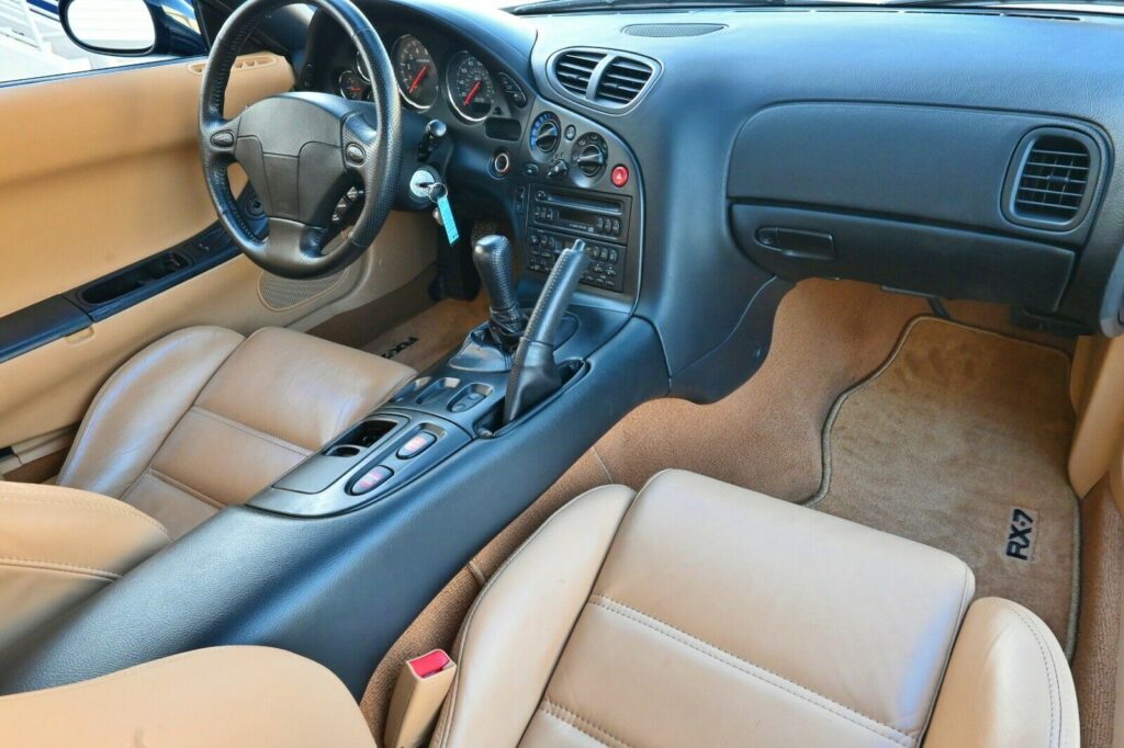 Interior view from passenger side of Montego Blue 1993 Mazda RX-7 Touring  