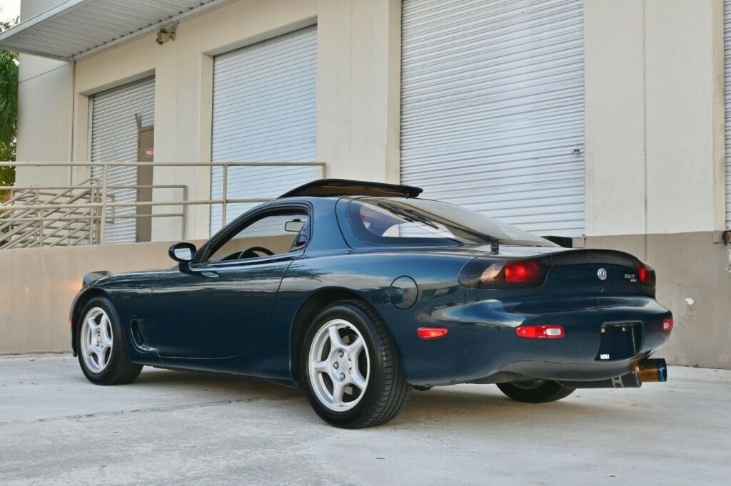 Montego Blue 1993 Mazda RX-7 Touring by loading docks