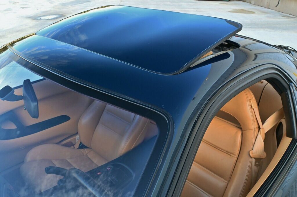 Painted sunroof of Montego Blue 1993 Mazda RX-7 Touring 